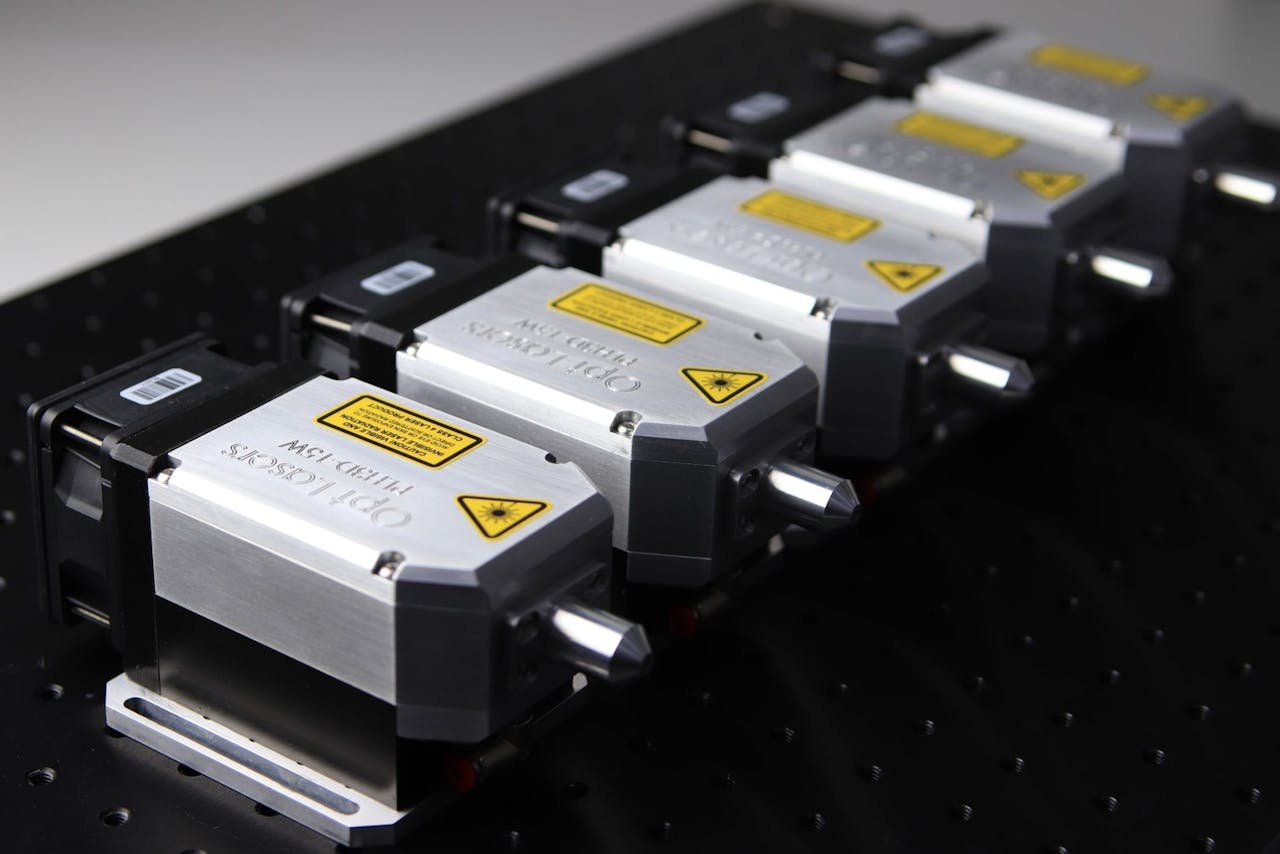 services-03 Close-up of aligned CNC laser modules, ideal for precision cutting and engraving.